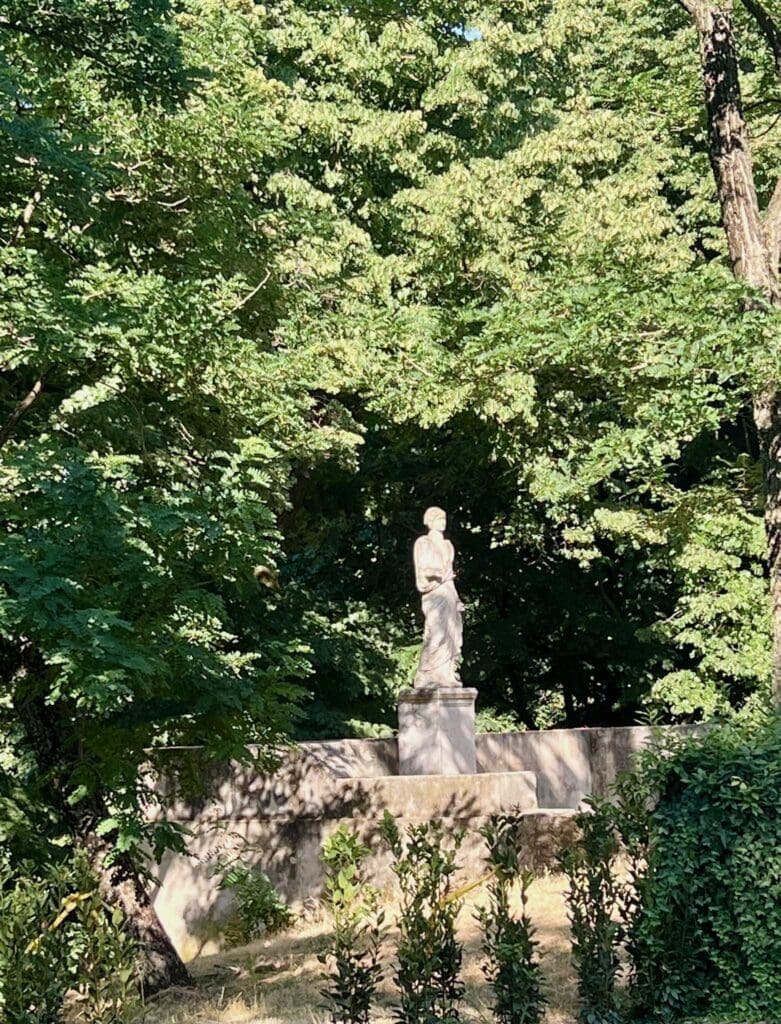 garden statue among greenery at Villa Borghese